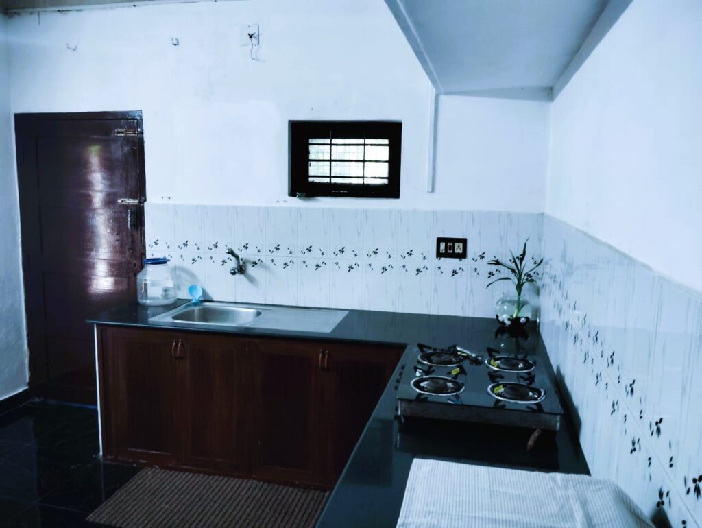 Spacious Kitchen in Alappuzha Layanila Homestay Always low price